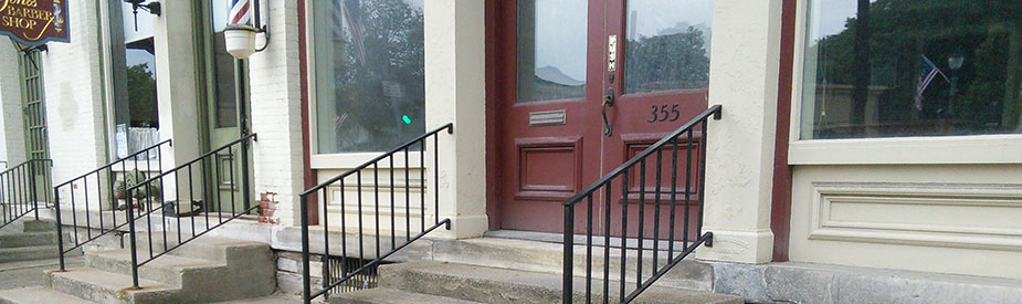 Putnam Block - Bennington, downtown streetscape, steps in front of barber shop